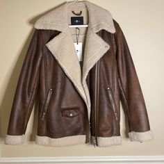 Never Worn Pleather Sherpa Bomber Jacket. Leather Jacket With Fleece Lining For Cold Weather, Fleece-lined Leather Jacket For Cold Weather, Hooded Leather Jacket With Fleece Lining For Fall, Fleece-lined Leather Jacket For Cold Fall Weather, Fall Leather Jacket With Fleece Lining, Spring Brown Outerwear With Fleece Lining, Sherpa Lined Jacket, Sherpa Lined, Line Jackets