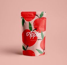 an apple bag on a pink background with the word apple printed on it's side