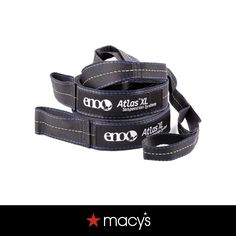 two black straps with white stitching on the ends and one has an inscription that reads,