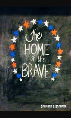 the home of the brave written on a chalkboard