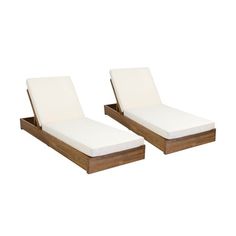 pair of outdoor chaise lounges with white cushions