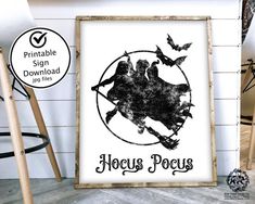 a black and white poster with the words hocus pocus on it