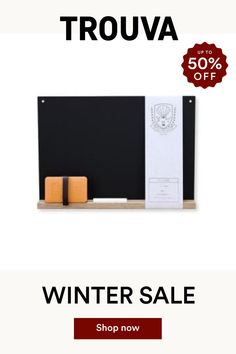 a black and white photo with the words trouva winter sale on it