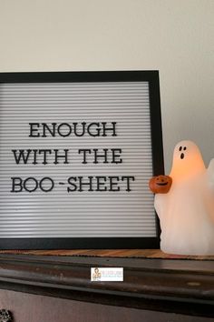 a ghost is next to a sign that says enough with the boo - sheet