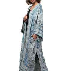 This Diana Sapphire Kimono Jacket Is An Artisanal Masterpiece, Crafted By Hand With Superior Quality And Detail. Featuring Intricate Hand Embroidery, The Jacket Exudes Bohemian Character And Charm. It Is Made With Thick, Sturdy Fabric For Durability And Versatility. Perfect For Festivals, Beach Days Or Casual Evenings, This Sustainable Jacket Is A Must-Have For Your Wardrobe. Artisanal Craftsmanship: Each Duster Is Meticulously Handcrafted By Skilled Artisans In India, Ensuring Unparalleled Qual Blue Casual Kimono For Winter, Blue Casual Winter Kimono, Casual Blue Kimono For Winter, Blue Bohemian Outerwear With Pockets, Casual Indigo Kimono For Spring, Blue Long Outerwear For Spring, Long Blue Outerwear For Spring, Long Blue Spring Outerwear, Blue Outerwear With Kimono Sleeves For Spring