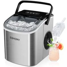 an image of a silver ice maker with drinks on the side and a drink glass next to it