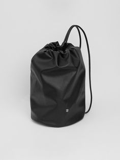 Composition : FAUX LeatherColor : BlackCountry of Origin : CHINA Luxury Black Bucket Bag For On-the-go, Modern Black Bucket Bag For Daily Use, Modern Black Bucket Bag, Modern Black Pouch-style Bucket Bag, Functional Black Leather Backpack For On-the-go, Black Bucket Bag For Travel, Black Bucket Backpack With Removable Pouch, Modern Black Tote Backpack, Black Bucket Backpack For Travel