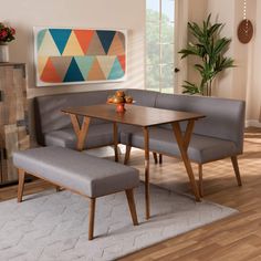 a corner table and bench in a living room