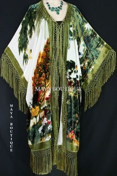 "DESCRIPTION : MADE IN USA BY MAYA Peacock Ivory Multi fringe kimono Silk Solid Velvet jacket opera coat. Cut in a Kimono style with hand knotted fringes down the front and around the hems Incredible peacock design on solid silk velvet Can be worn with many outfits One size Fits All - Free bust, 57\" hips, 44\" long (plus the 7\" fringes) Fits ALL sizes , UP to 5X (approximately-please measure yourself) We do have other designs & colors in the same style & also beaded Thanks for looking Otherworldly Beauty, Velvet Fringe, Opera Coat, Altered Clothing, Kameez Designs, December 2nd, Fringe Kimono, Kimono Coat, Kimono Duster