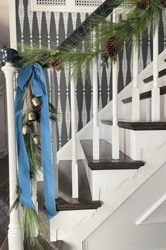 christmas decorations on the banisters and stairs