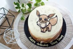 a birthday cake with a cartoon character on it