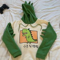 Adult Small. Never Worn! Fun Winter Hoodie, Fun Winter Hoodie With Drawstring Hood, Green Stretch Hoodie For Spring, Winter Fun Long Sleeve Hoodie, Fun Long Sleeve Winter Hoodie, Green Stretch Casual Sweatshirt, Spring Green Stretch Hoodie, Fun Hooded Fall Sweatshirt, Green Sweatshirt With Kangaroo Pocket For Spring