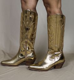 Tonal stitching modernizes a Western-inspired leather boot framed by a pointy toe and tapered block heel. 2 1/2" heel leather upper/textile and synthetic lining/ synthetic sole. Gold Leather Knee-high Boots For Fall, Gold Leather Western Boots, Fitted Gold Western Boots, Gold Snip Toe Boots For Rodeo, Gold Snip Toe Boots For Fall, Gold Western Boots With Almond Toe, Western Gold Heeled Boots, Western Style Gold Heeled Boots, Western Gold Boots With Pointed Toe