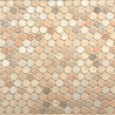 a wall made out of several different types of coins