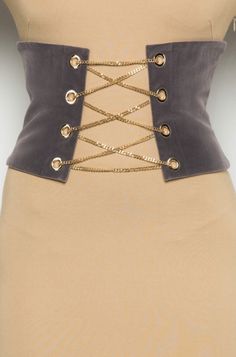 Dress up with our faux suede chained bustier belt. Wear over your favorite dress or oversized Tee. Faux Suede Grey Adjustable chain Zip-up back 100% Polyester This Item is Final Sale Bio Fashion, Velvet Bustier, Belt Dress, Gray Suede, Trendy Jewelry, Oversized Tee, Favorite Dress, Stylish Accessories, Belts For Women