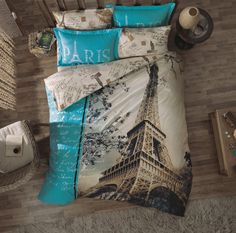 an aerial view of a bed with the eiffel tower in paris on it