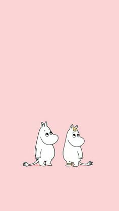 two white animals sitting next to each other on a pink background