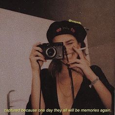 a woman taking a selfie in front of a mirror with the caption, captured because one day they all will be memories again