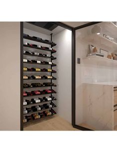 a wine rack in the corner of a kitchen