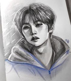 a pencil drawing of a person with a hoodie over their shoulders and his eyes closed