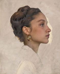 a painting of a woman's profile with her hair in a bun and earrings