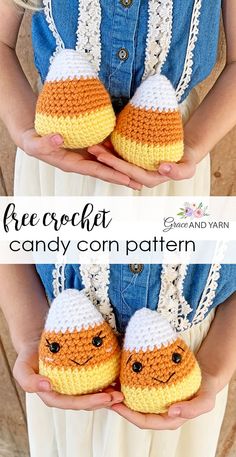 two crocheted candy corn cozies are shown in front of a woman's hands