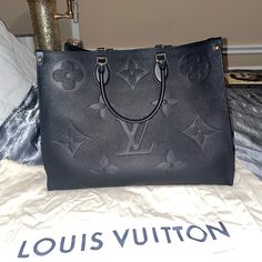 Gorgeous Lightly Used Louis Vuitton Purse! It’s Huge And Fits Everything. I Bought It From The Louis Store A Few Months Ago. Dustbag Included. There Were A Few Pen Stains On The Inner Suede But Have Been Removed/Cleaned. Reasonable Offers Considered Luxury Black Monogram Bags, Luxury Black Monogrammed Bags, Black Monogram Canvas Bag, Black Monogram Bags For Formal Occasions, Formal Black Monogram Bag, Formal Black Monogrammed Bag, Formal Black Monogram Bags, Pen Stain, Used Louis Vuitton