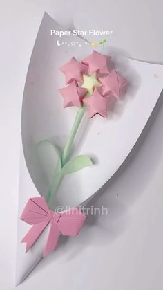 the paper star flower is pink and white