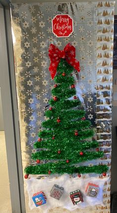 a christmas tree made out of tinsel on display