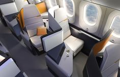 the inside of an airplane with several seats and windows on each side, all facing different directions