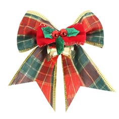 a red and green bow with bells on it