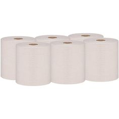 four rolls of white toilet paper on a white background