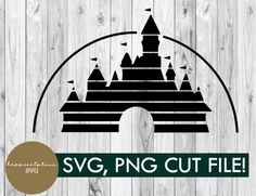 the svg cut file for disney castle is shown in black and white on a wooden background