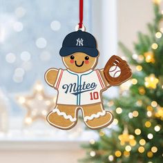 a christmas ornament shaped like a baseball player