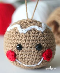 a crocheted ornament that has been made to look like a ball of yarn