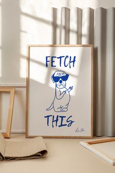 a poster with the words fetch this on it next to a pair of pencils