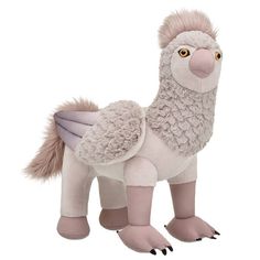 a stuffed animal that looks like an alpaca with wings on it's back