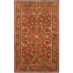 an orange and red rug with floral designs on the bottom, in front of a white background