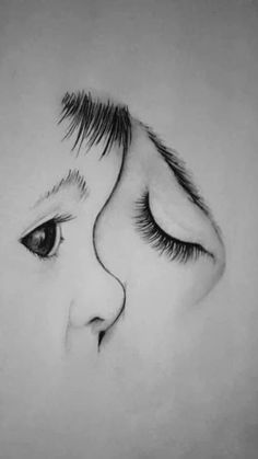 a drawing of a child's face with long eyelashes