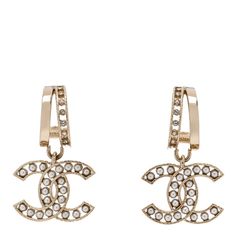 This is an authentic pair ofCHANEL Crystal Pearl CC Hoop Drop Earrings in Gold. This stylish Chanel earring has a crystal CC logo dangling from the double hoop earring with a gold side and a crystal lined side on each earring. Double Hoop Earring, Hoop Drop Earrings, Double Hoop Earrings, Drop Earrings Gold, Luxury Earrings, Chanel Earrings, Chanel Jewelry, Earrings In Gold, Everyday Earrings