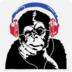 a monkey with headphones on it's ears