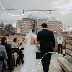 a bride and groom walking down the aisle at their wedding ceremony in new york city