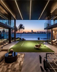 a living room filled with furniture and a tennis court