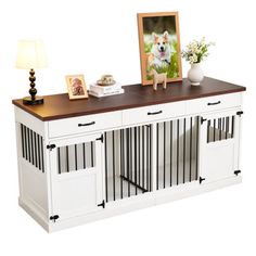 a dog is standing on top of a table with his paw prints and photo frame