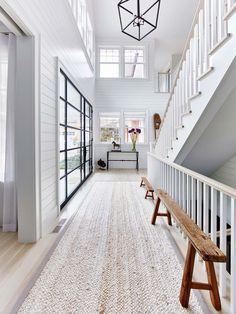 the hallway is clean and ready for us to use as an entrance way in this house