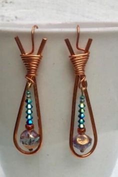 "Handcrafted copper and czech glass bead earring, approx 2.5\" long, but can be made shorter or longer.  There are two finish variationsnon tarnish copper, or non tarnish silver over copper." Nickel-free Copper Dangle Teardrop Earrings, Unique Copper Earrings With Dangling Beads, Beaded Copper Teardrop Earrings, Copper Beaded Teardrop Earrings, Wire Wrapped Copper Beaded Dangle Earrings, Copper Teardrop Beaded Earrings, Bohemian Copper Wire Wrapped Teardrop Earrings, Bronze Copper Beaded Dangle Earrings, Copper Teardrop Dangle Earrings