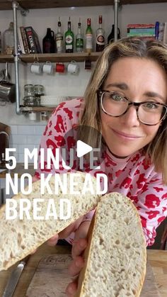 a woman holding a loaf of bread on top of a cutting board with the words 5 minute no knead bread