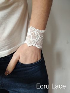 "Versatile stretch lace wrist cuff bracelet in ecru - visit my shop for more designs  Handbands, wrist cuffs, wrist wraps - visit my shop for more color matching accessories *Handmade with love and care in a smoke free home *Every wrist cuff is sewn by me *Ideal for covering wrist tattoos *Stretchy and soft lace *Fabulous accessory for your outfit *Goes well with everything *Unique and standing out COLOR: ecru  MATERIALS: stretchy lace SIZE: CHOOSE YOUR SIZE from the drop down menu If you choose Adjustable White Cuff Bracelet, White Bohemian Cuff Bracelets, Adjustable White Wristlet With Wrist Strap, Ceremony Outfit, Wrist Tattoo Cover Up, Wrist Wraps, Tattoo Cover Up, Lace Bracelet, Tattoo Cover