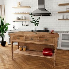 a kitchen with wooden flooring and white brick walls, an oven hood above the stove