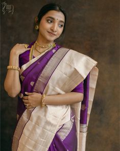 This exquisite Kathiri Poo Kanchipuram silk saree showcases intricate floral zari buttas adorning the body. The elegant vennai vellai border and pallu are enriched with traditional motifs, including puli nagam, vairam, neli kodi poun, and godhumai zari buttas, making it a timeless masterpiece Cotton Sarees Online Shopping, Dhoti Saree, Long Blouse Designs, Cotton Sarees Online, Traditional Silk Saree, Organza Sarees, Traditional Motifs, Indian Textiles, Kanjivaram Sarees